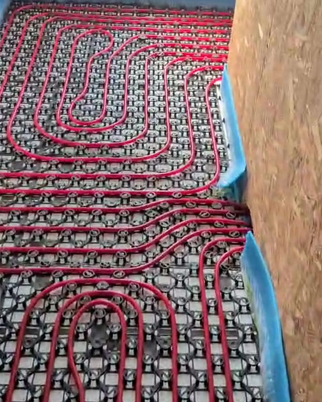 Underfloor heating pipes laid in loops