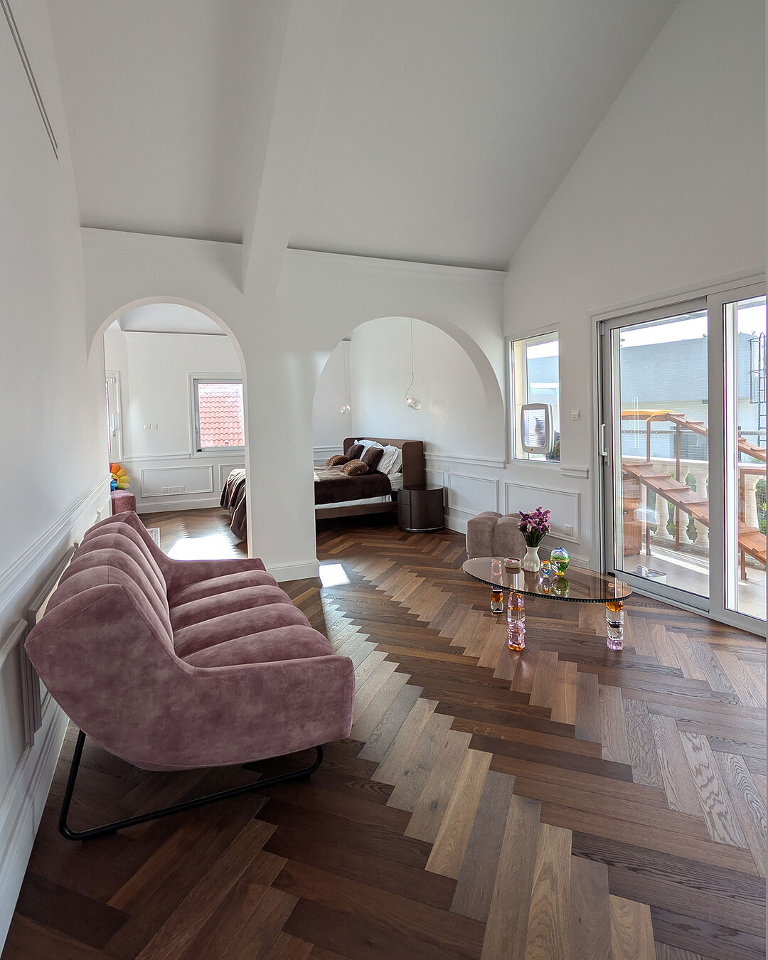 Upstairs lounge with arched openings